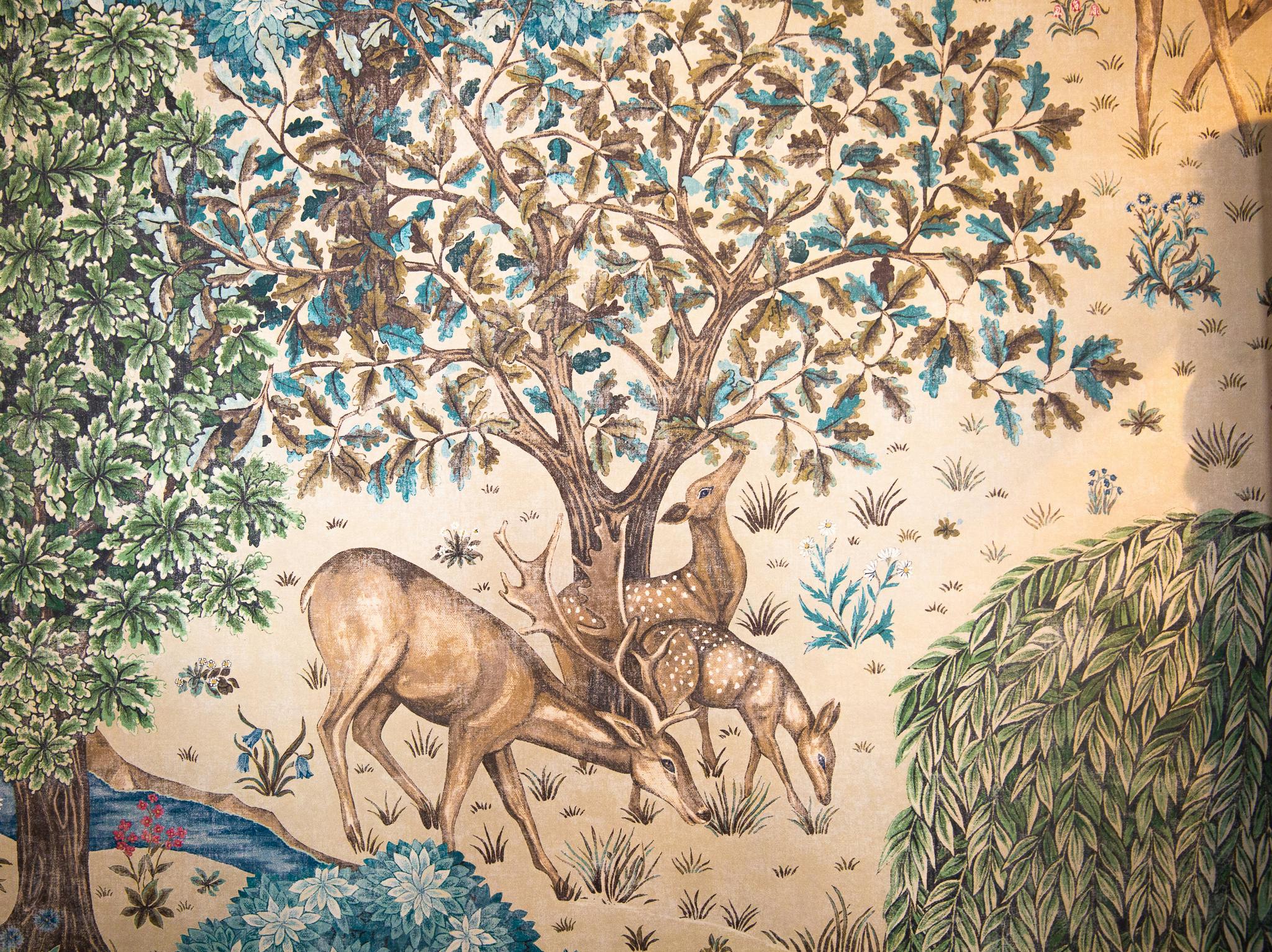 Tapestry of deer in The Fielding Room, ideal for upscale events and retreats.