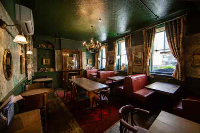 Cozy Fielding Room at Bow Street Tavern, perfect for intimate meetings and small events.