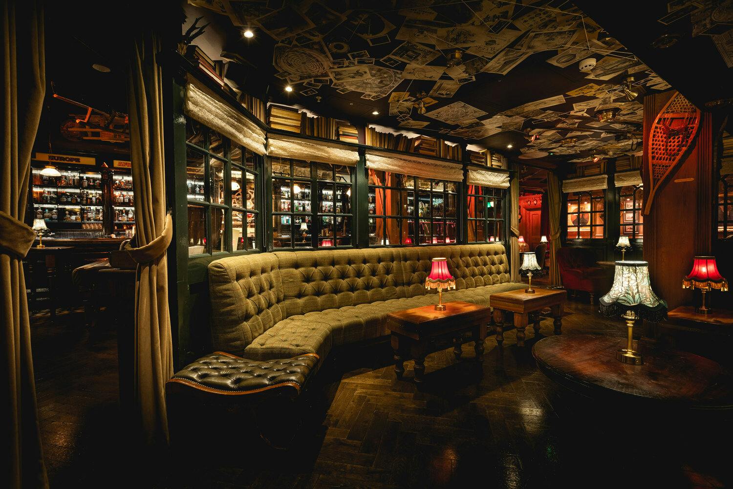 Map Room at Mr Fogg's: cozy lounge with plush seating for networking events and gatherings.