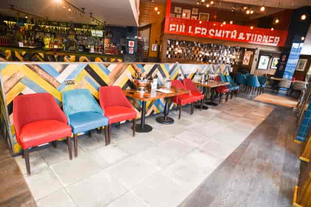 Vibrant Craft Cabinet venue with colorful seating for casual meetings and networking events.
