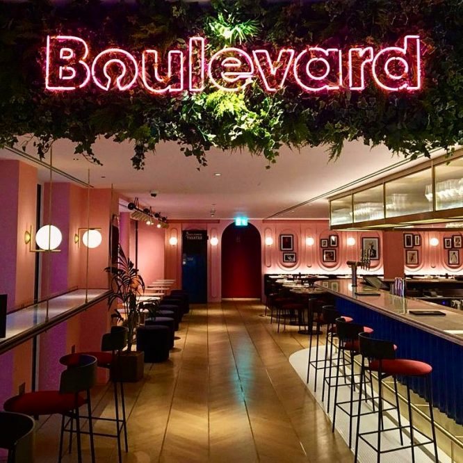 Stylish restaurant bar with modern decor, perfect for events and meetings.