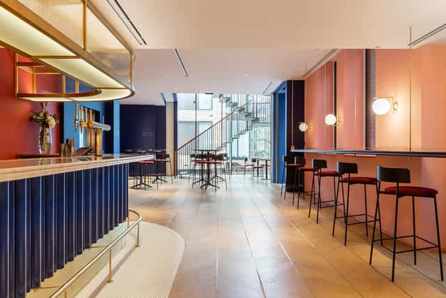 Elegant restaurant and bar venue with sleek design, perfect for social events and meetings.