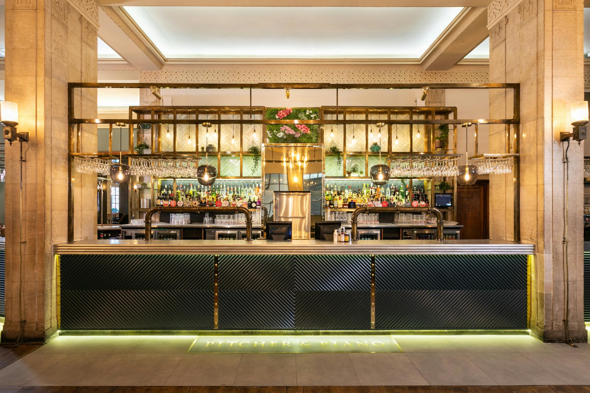 Stylish bar at Pitcher & Piano Cornhill, ideal for networking events and social gatherings.