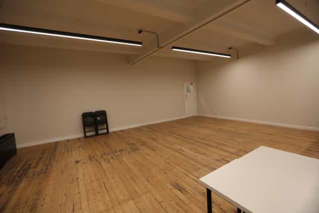 Spacious minimalist meeting room in The International College of Musical Theatre for workshops.