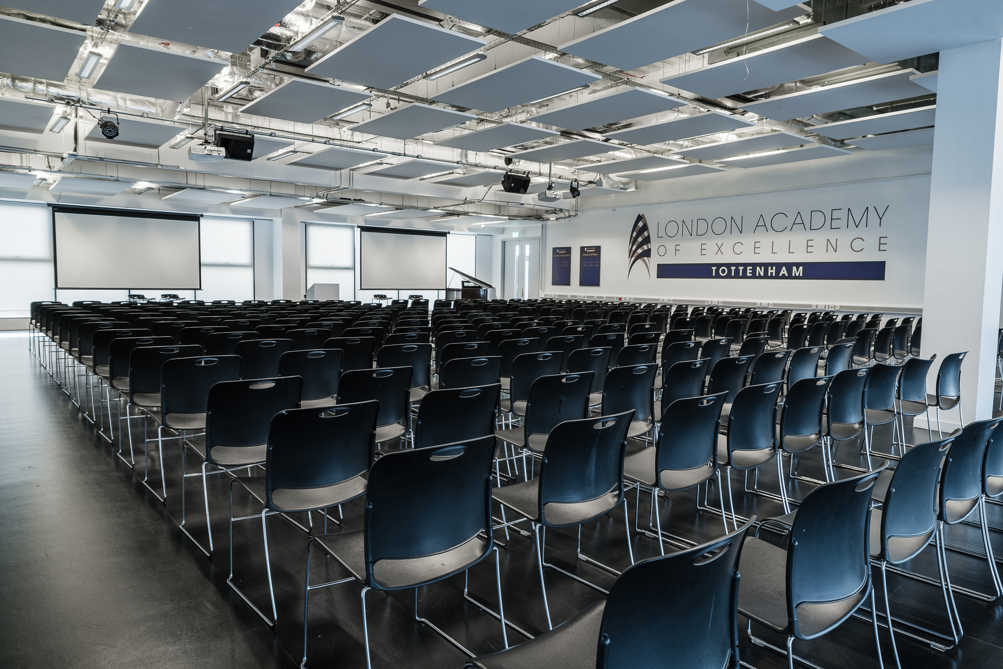 Spacious conference room at London Academy of Excellence for corporate events and workshops. - Banner