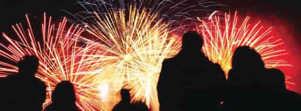 Vibrant fireworks illuminate Rudding Park Library for a memorable outdoor event.