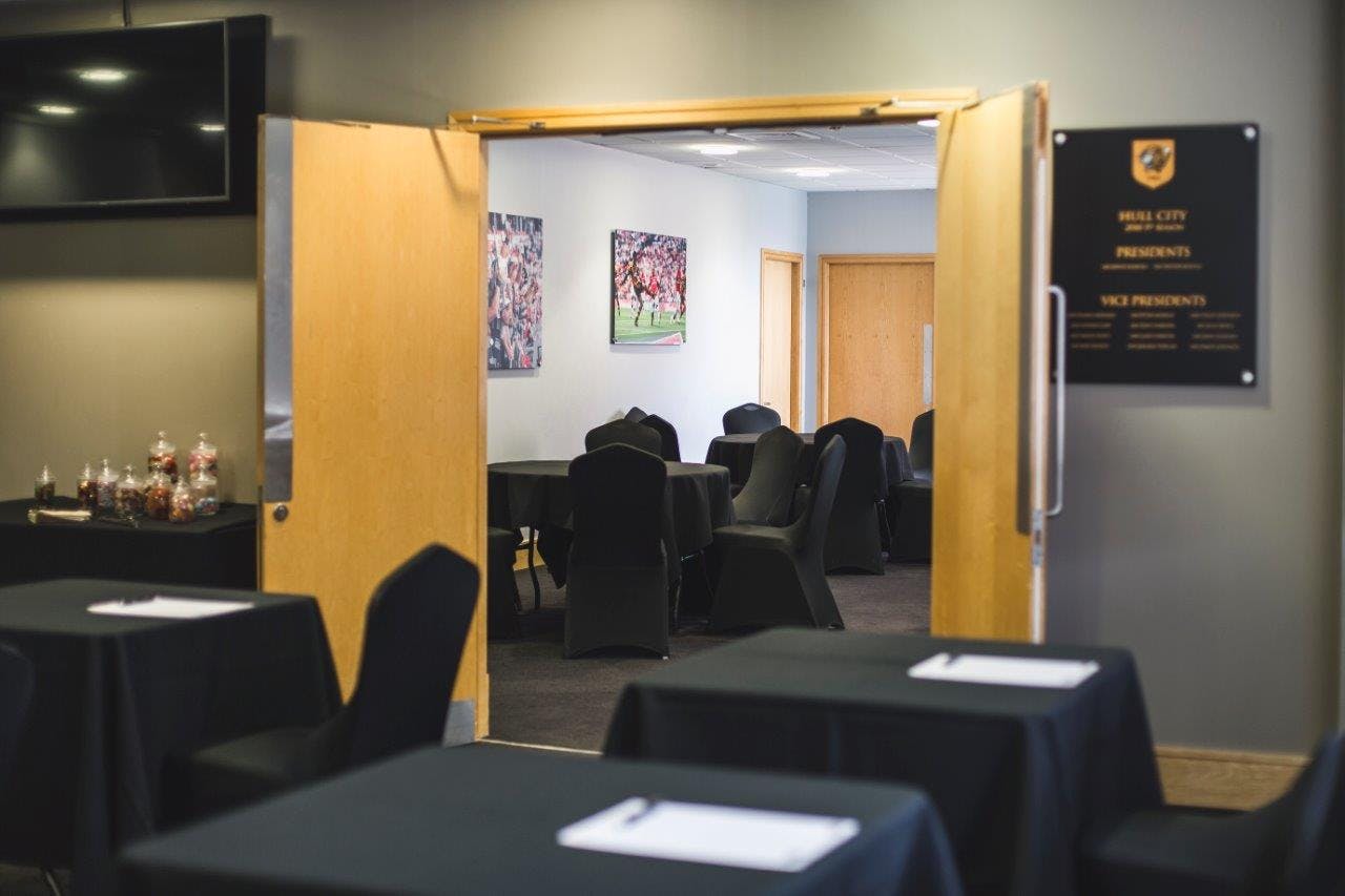 Vice President's Suite at MKM Stadium, featuring organized tables for professional events.