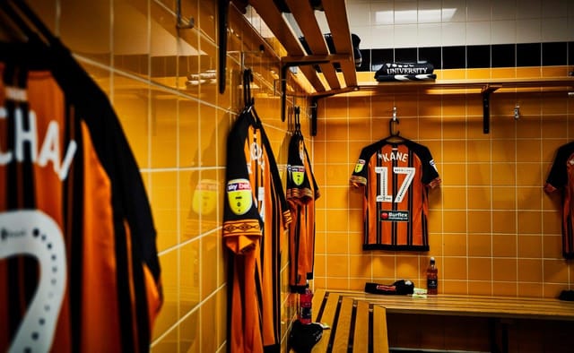 Vibrant MKM Stadium locker room, ideal for team-building events and workshops.