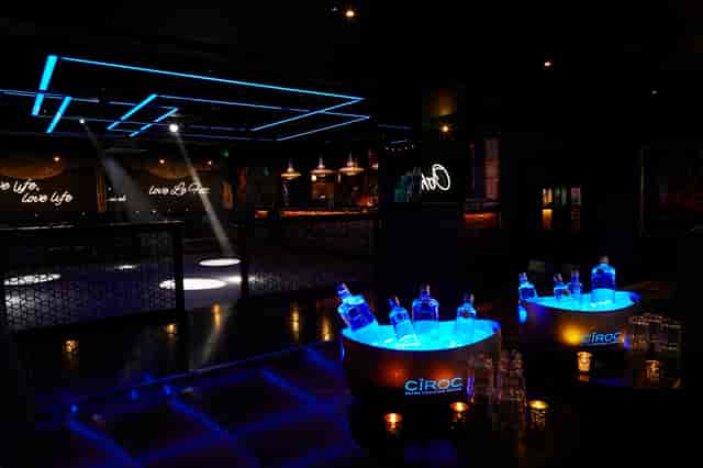 Stylish Le Club event space in Le Fez with illuminated Ciroc bottles for upscale parties.