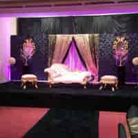 Elegant stage setup at Praba Banqueting Suite for high-end events and presentations.