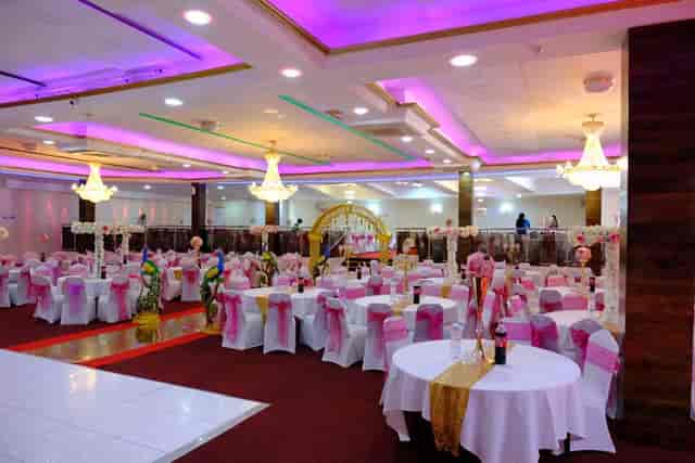 Elegant Praba Banqueting Suite with pink accents, perfect for weddings and formal events.