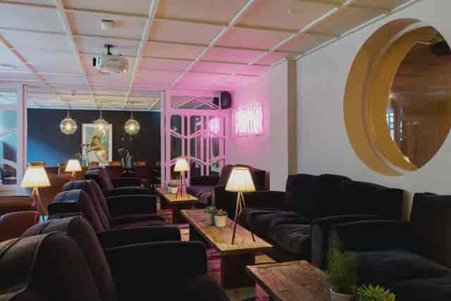 Stylish lounge at The River Bar, ideal for networking and informal meetings.