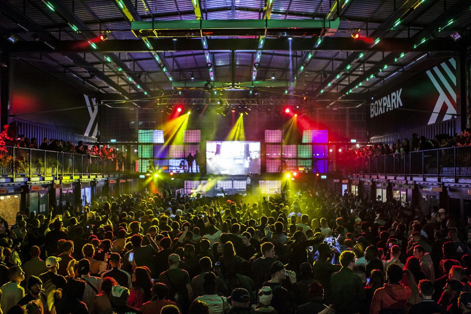 Vibrant event space at Boxpark Croydon for concerts and corporate celebrations.