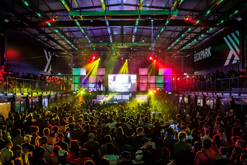 Vibrant event space at Boxpark Croydon for concerts and corporate celebrations.