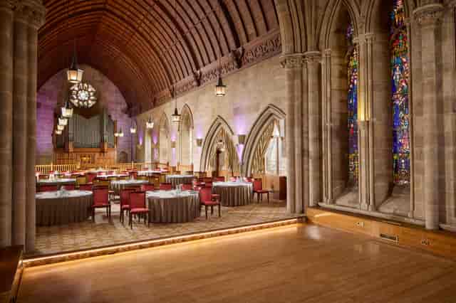 Harry Clarke at Ashdown Park Hotel: Gothic architecture venue for luxury events and ceremonies.