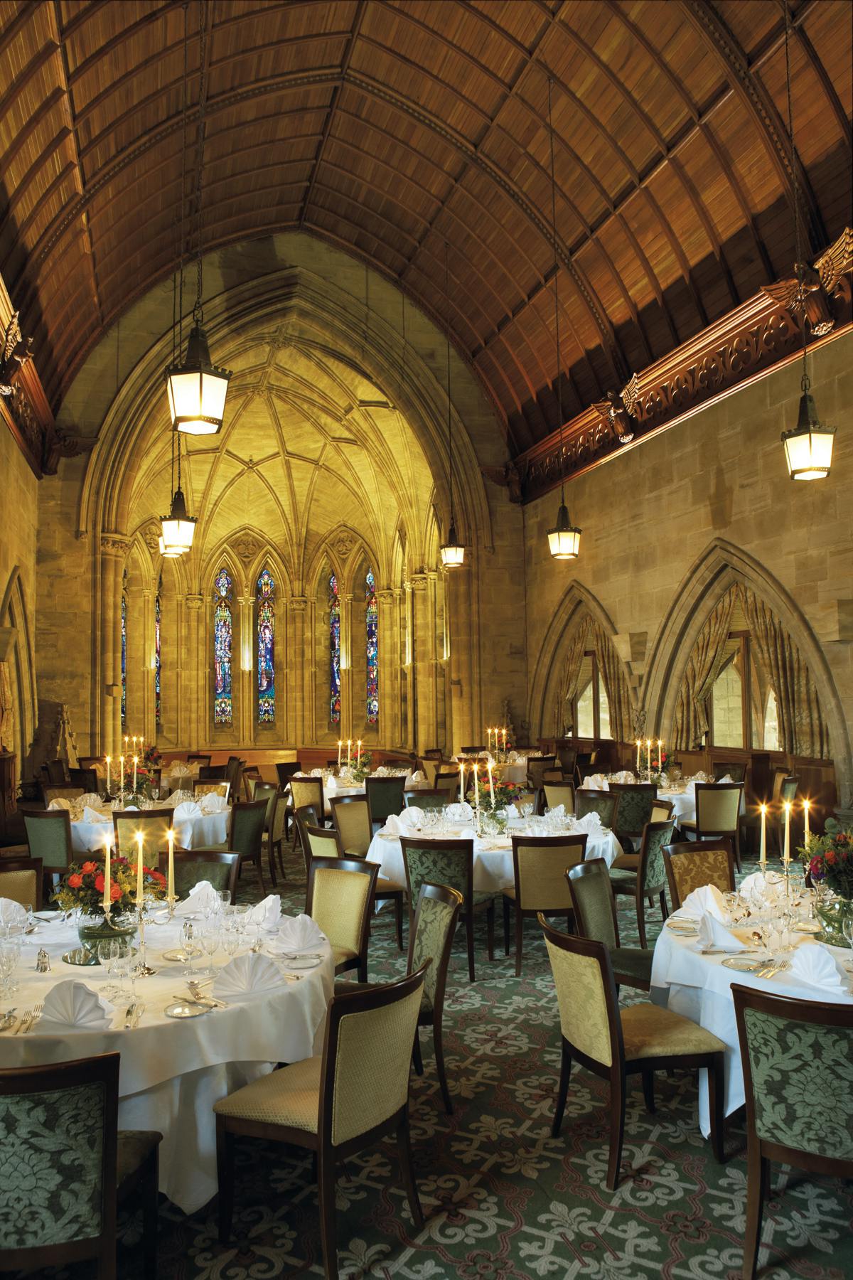 Elegant event space with vaulted ceiling, ideal for weddings and corporate gatherings.