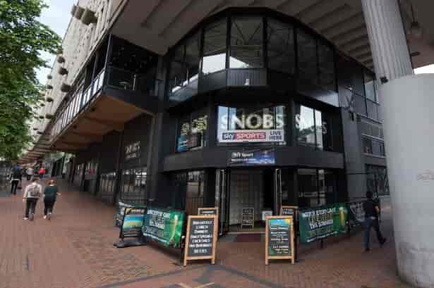 VIP Mezzanine Suite at SNOBS, modern venue for sports events and corporate gatherings.