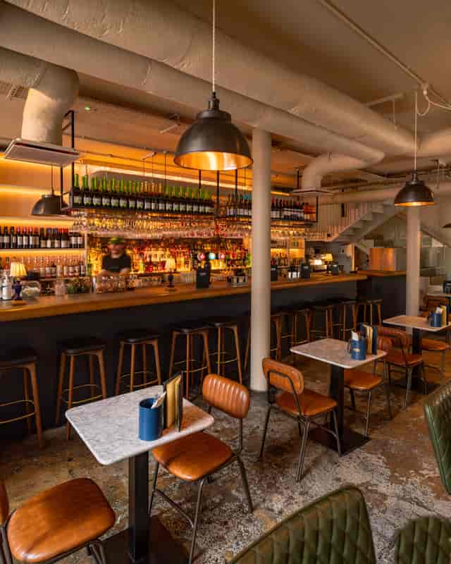 Stylish bar area in Paradiso Soho, ideal for intimate gatherings and networking events.