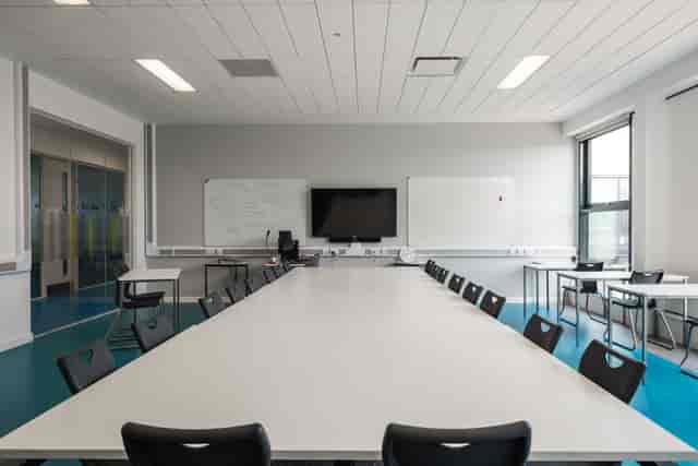 Modern breakout room at London Academy of Excellence for workshops and team discussions.