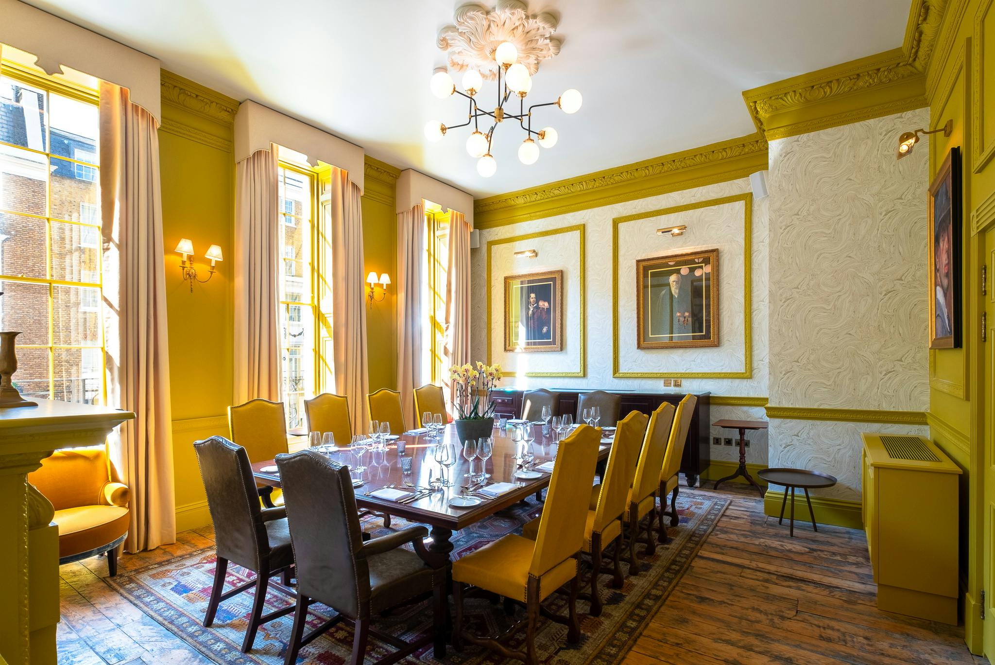 Portman Room at Home Grown Club: elegant meeting space with wooden table, ideal for events.