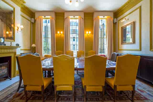 Portman Room at Home Grown Club: elegant meeting space with natural light for events.