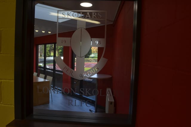 Modern Function Room & Bar in London with large windows for events and meetings.