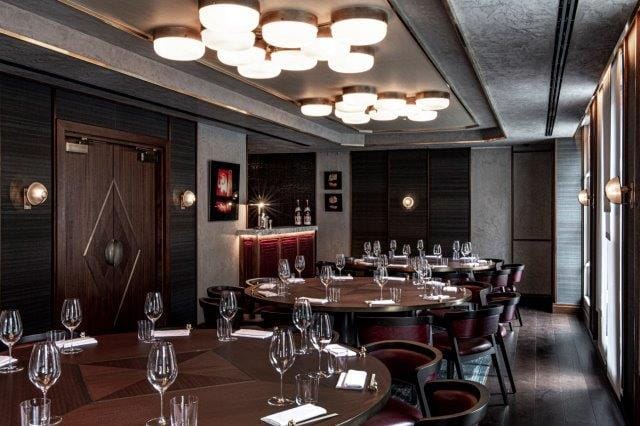 Elegant dining room in Lucky Cat by Gordon Ramsay, ideal for upscale events and meetings.