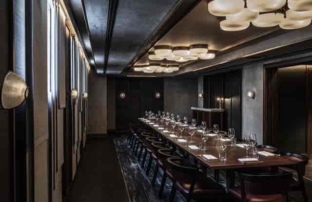 Sophisticated private dining room with elegant table setting for exclusive events.