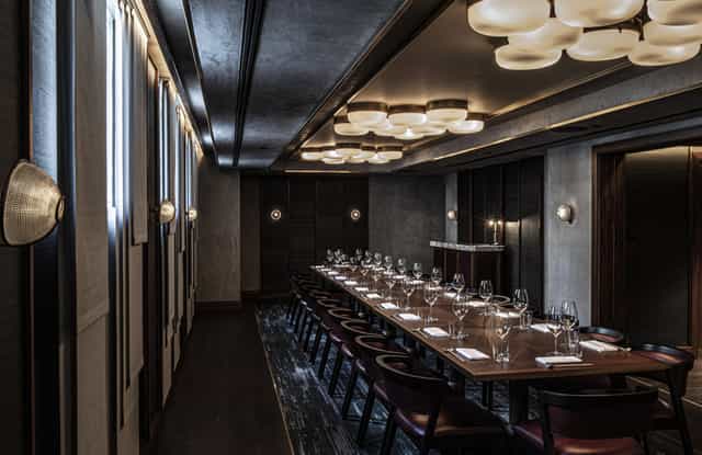 Sophisticated private dining room with elegant table setting for exclusive events.