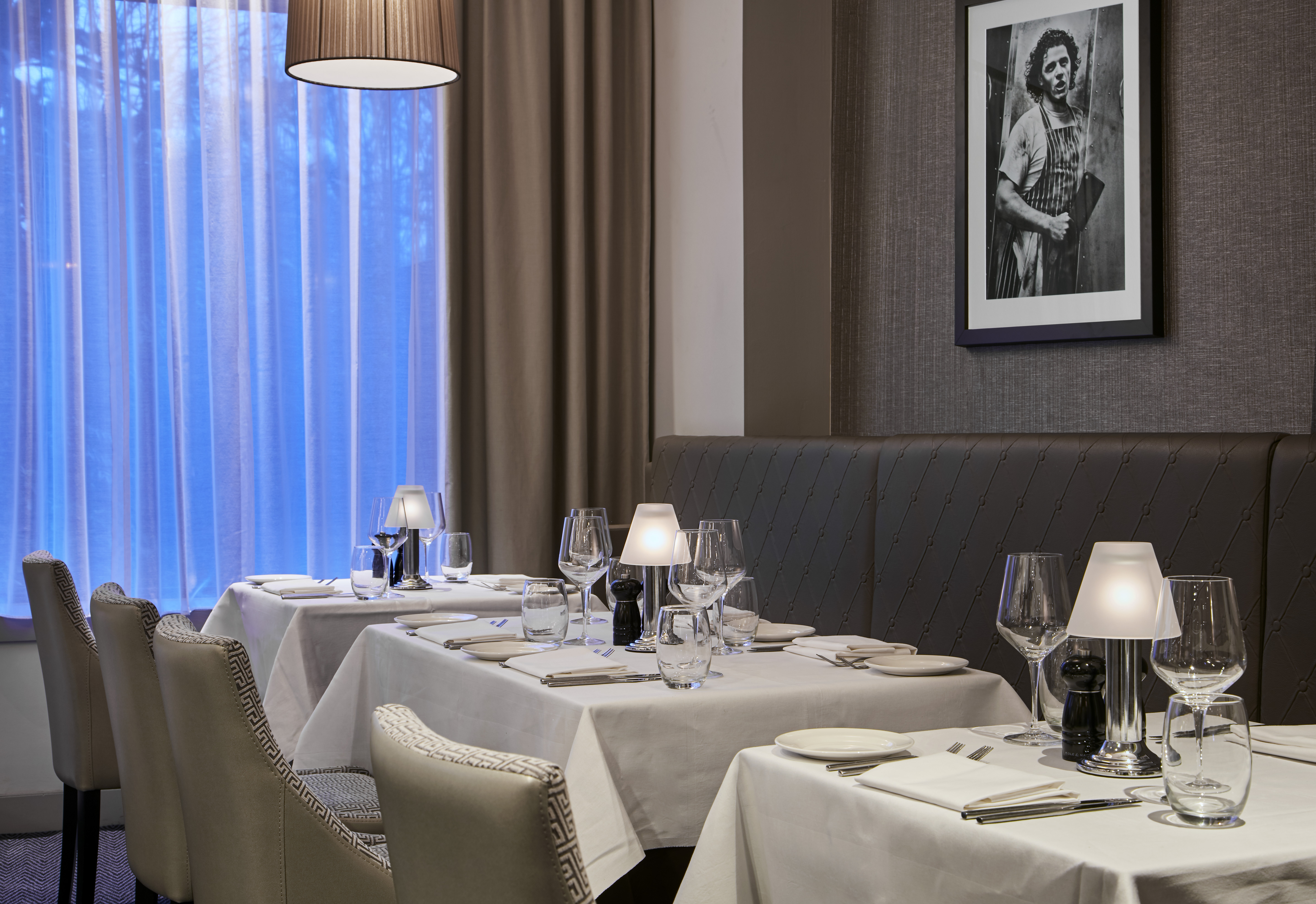 Elegant dining setup at Marco Pierre White Steakhouse for upscale events and private dinners. - Banner