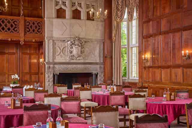 Tylney Suite boardroom with historic wood paneling for corporate meetings and formal dinners.