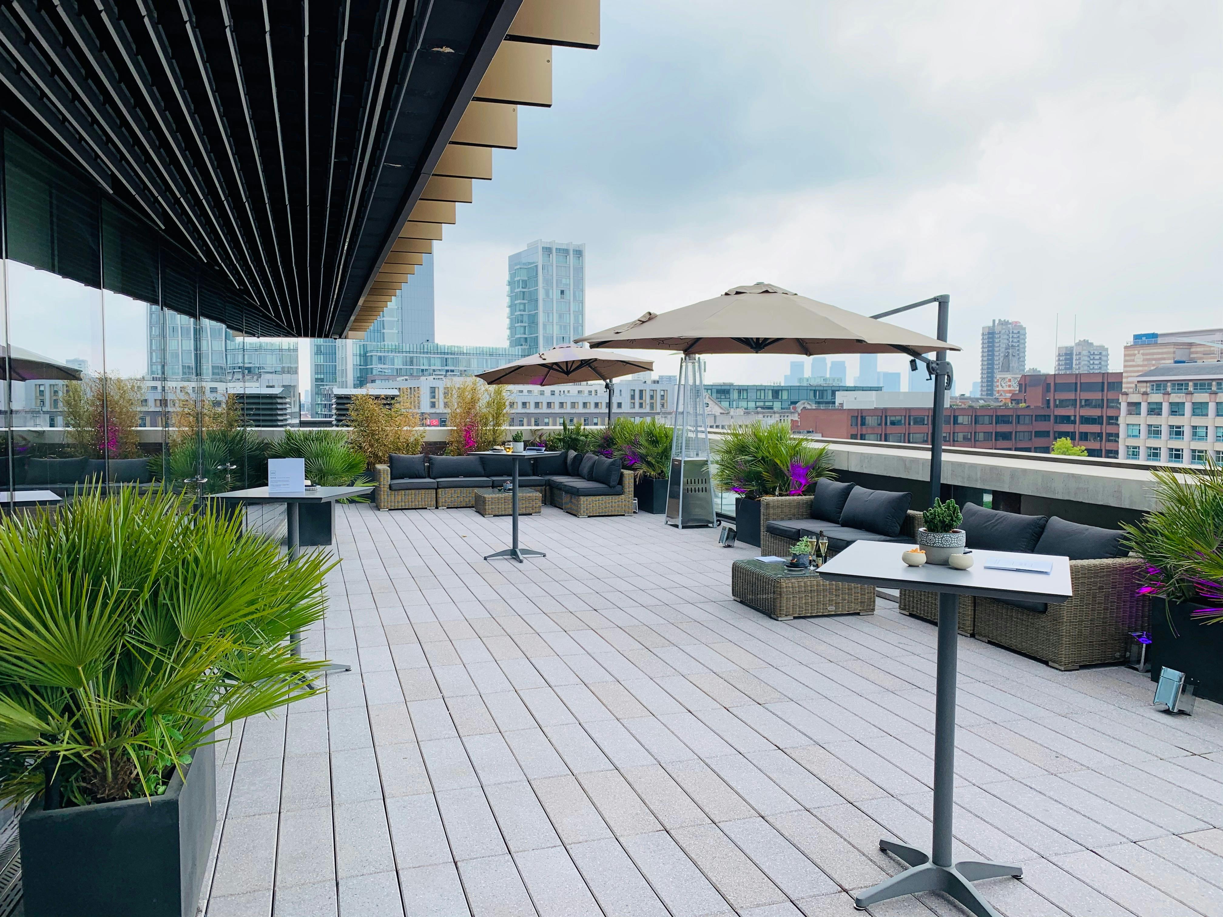 Stylish rooftop terrace with city views, perfect for events and gatherings.