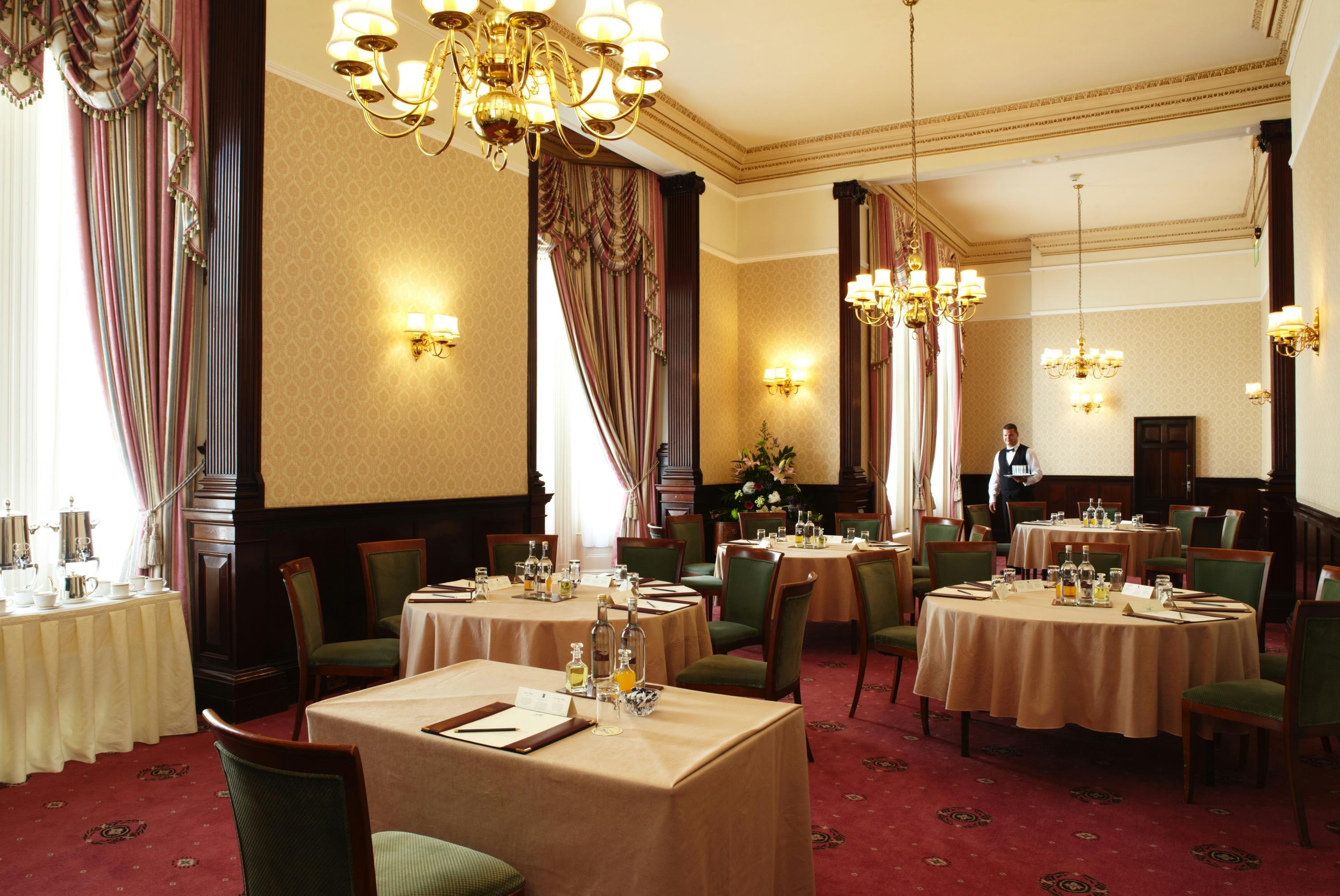 Elegant dining room in The Dukes Room, Grand Hotel Eastbourne for formal events.