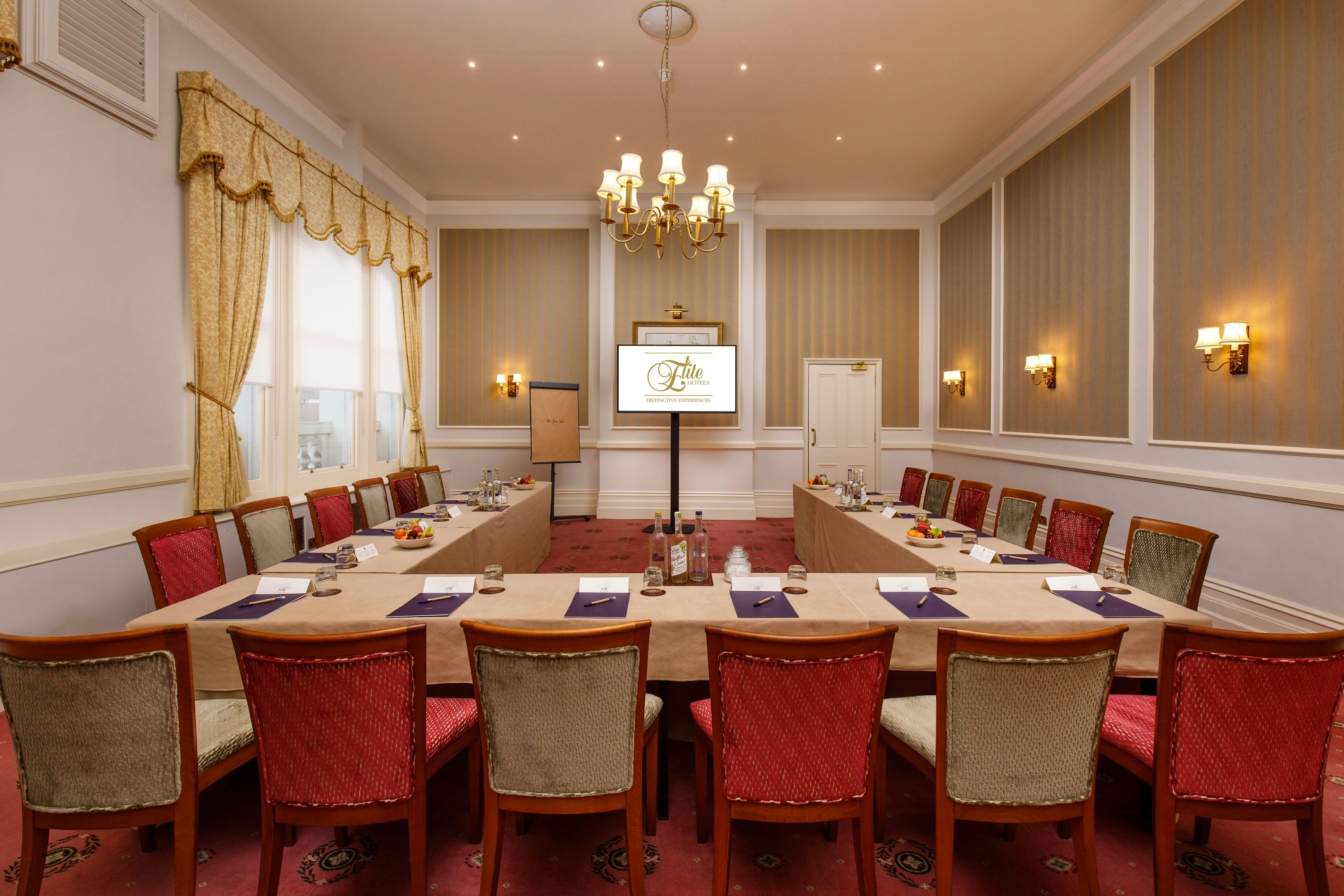 Norfolk Room at Grand Hotel Eastbourne, U-shaped tables for corporate meetings.