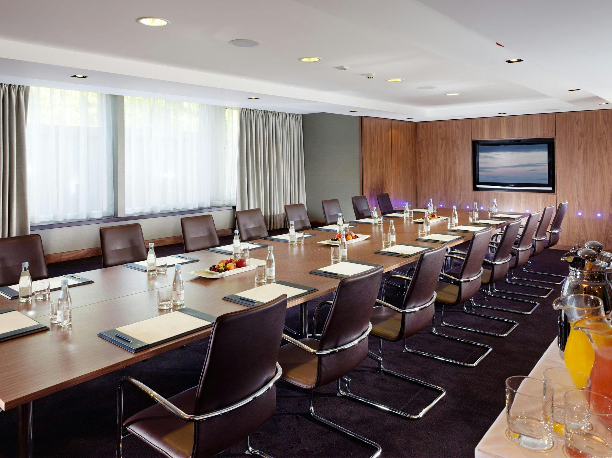 Balmoral Executive Boardroom at Royal Garden Hotel, modern design for corporate meetings.