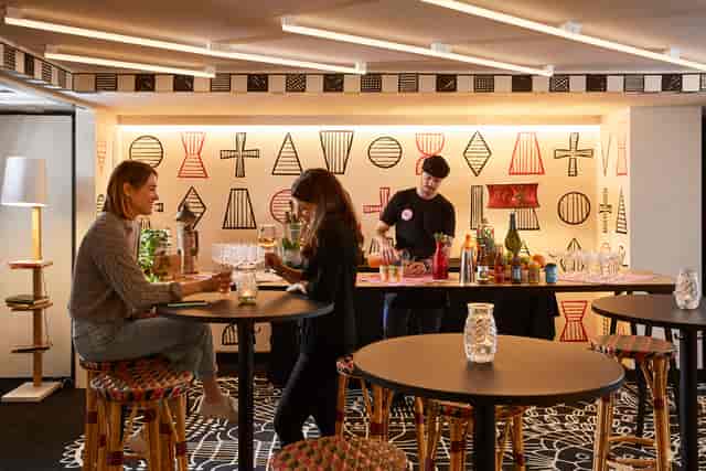 Stylish bar at Atelier 1, Mama Shelter London, ideal for networking events and receptions.