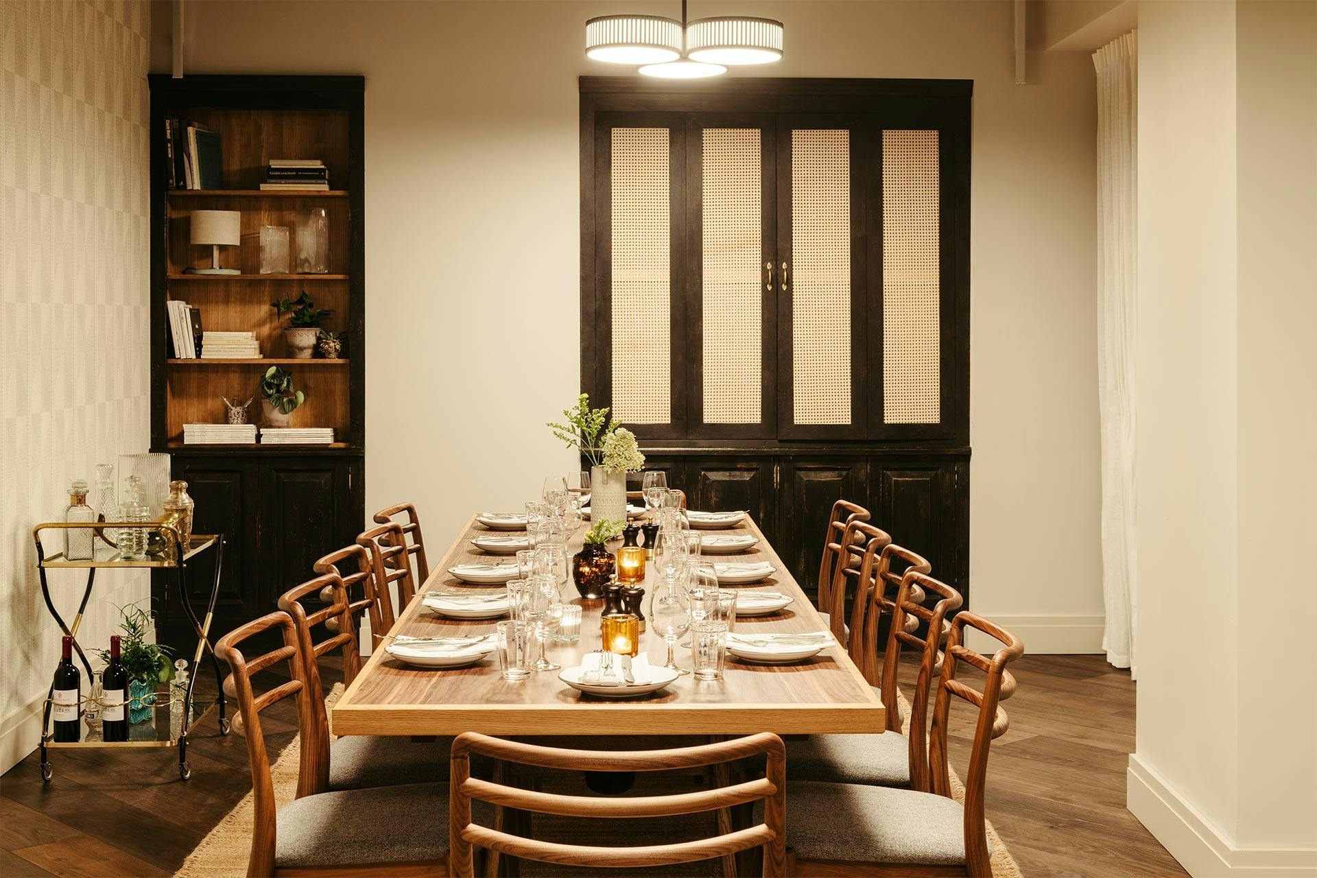 Dining room at The Hoxton Southwark with elegant table setup for corporate dinners and gatherings.