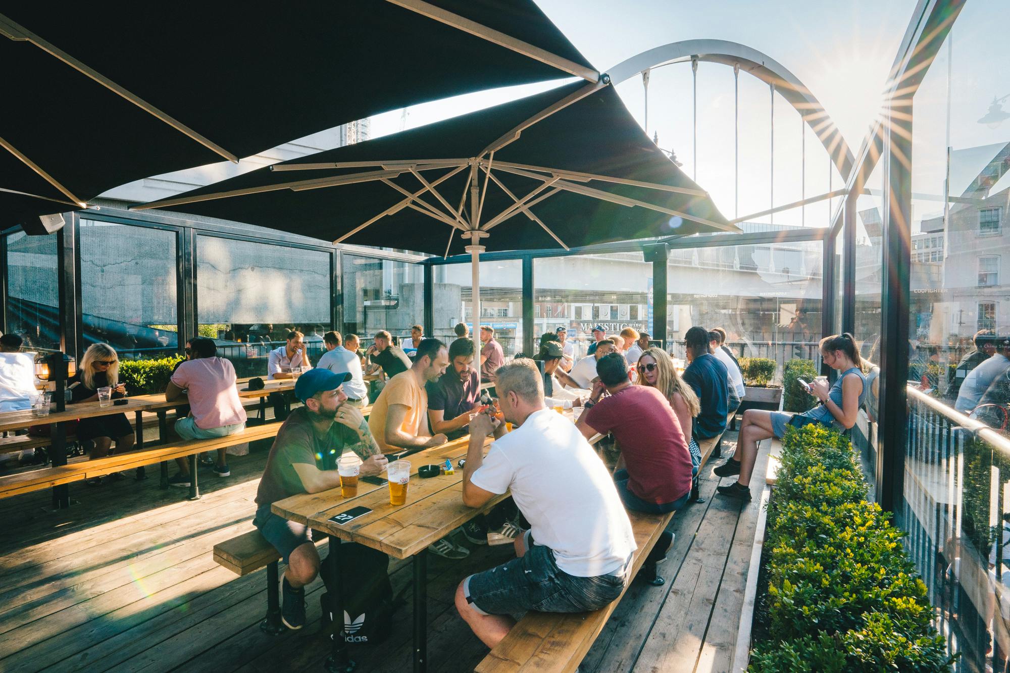 Vibrant outdoor venue takeover at Boxpark Shoreditch for networking and social events.