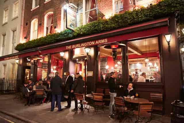 Vibrant Burlington Arms pub with cozy interior, perfect for networking events and gatherings.
