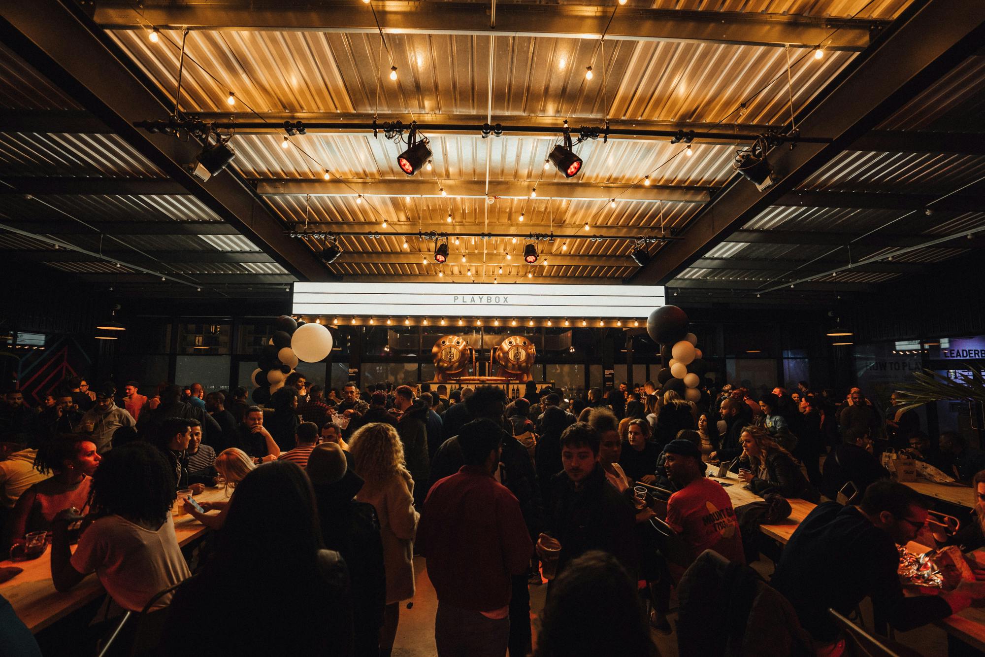 Vibrant PlayBox Bar at Boxpark Wembley, perfect for networking events and social gatherings.