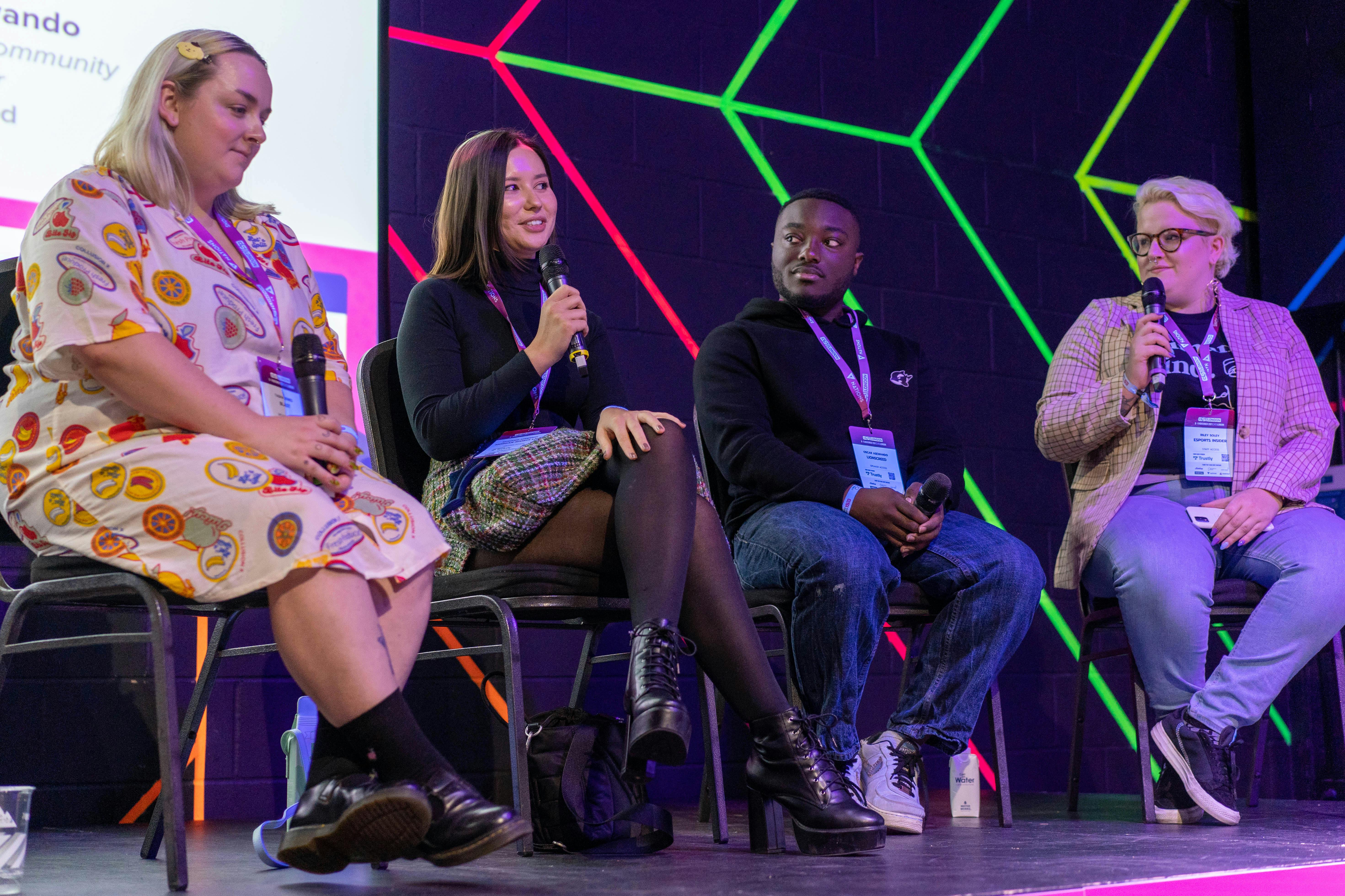 Panel discussion at Playbox Room, Boxpark Wembley, showcasing diverse perspectives in events.