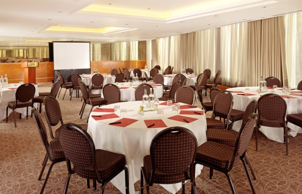 York Suite meeting space with round tables, ideal for workshops and seminars.