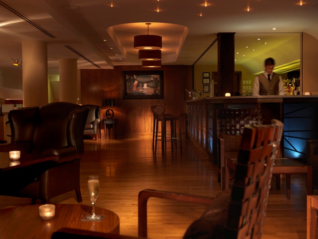 Sophisticated lounge at Bertie's Bar, ideal for cocktail receptions and networking events.