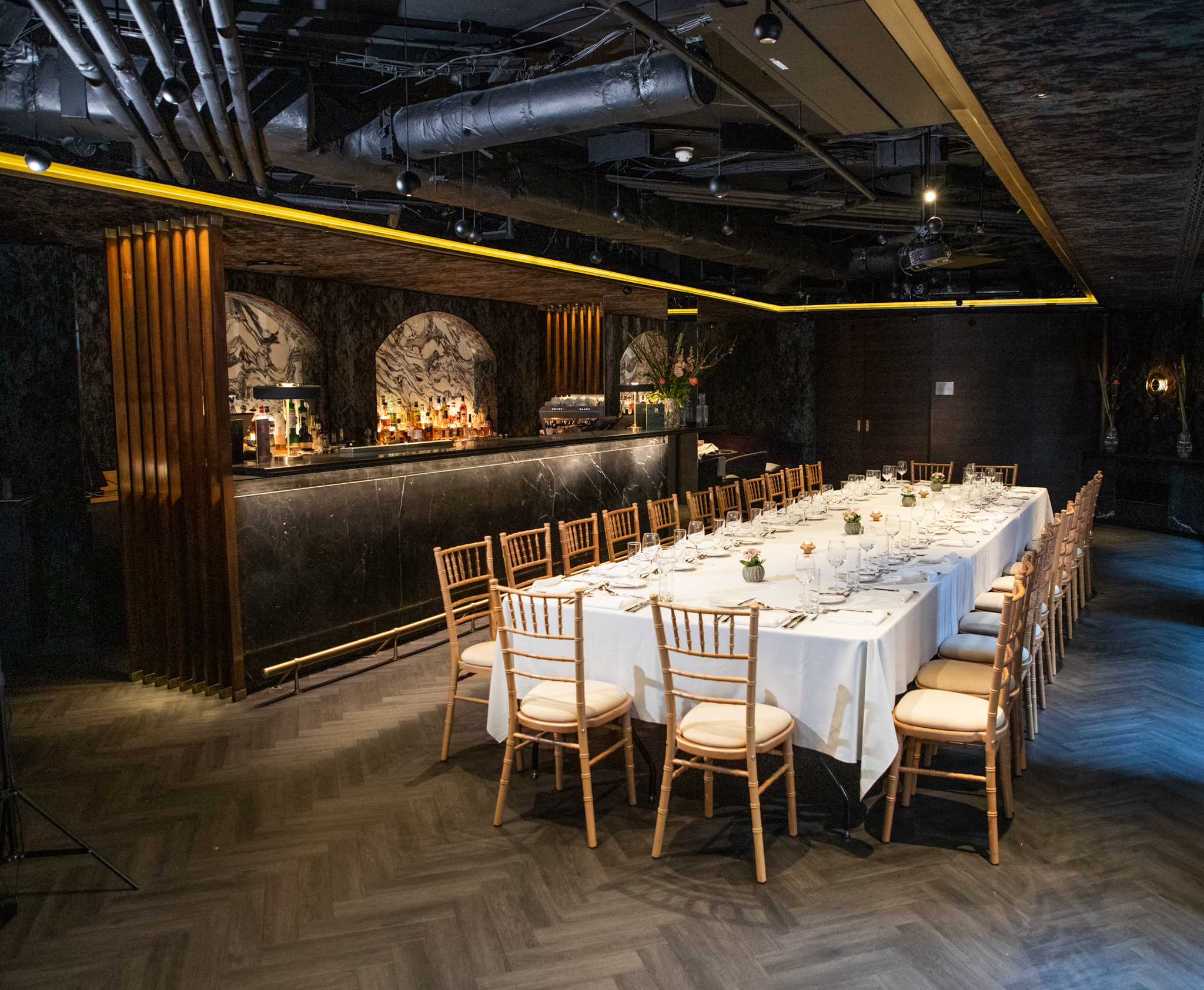 Elegant event space at 12 Hay Hill, featuring a formal dining setup for gatherings. - Banner