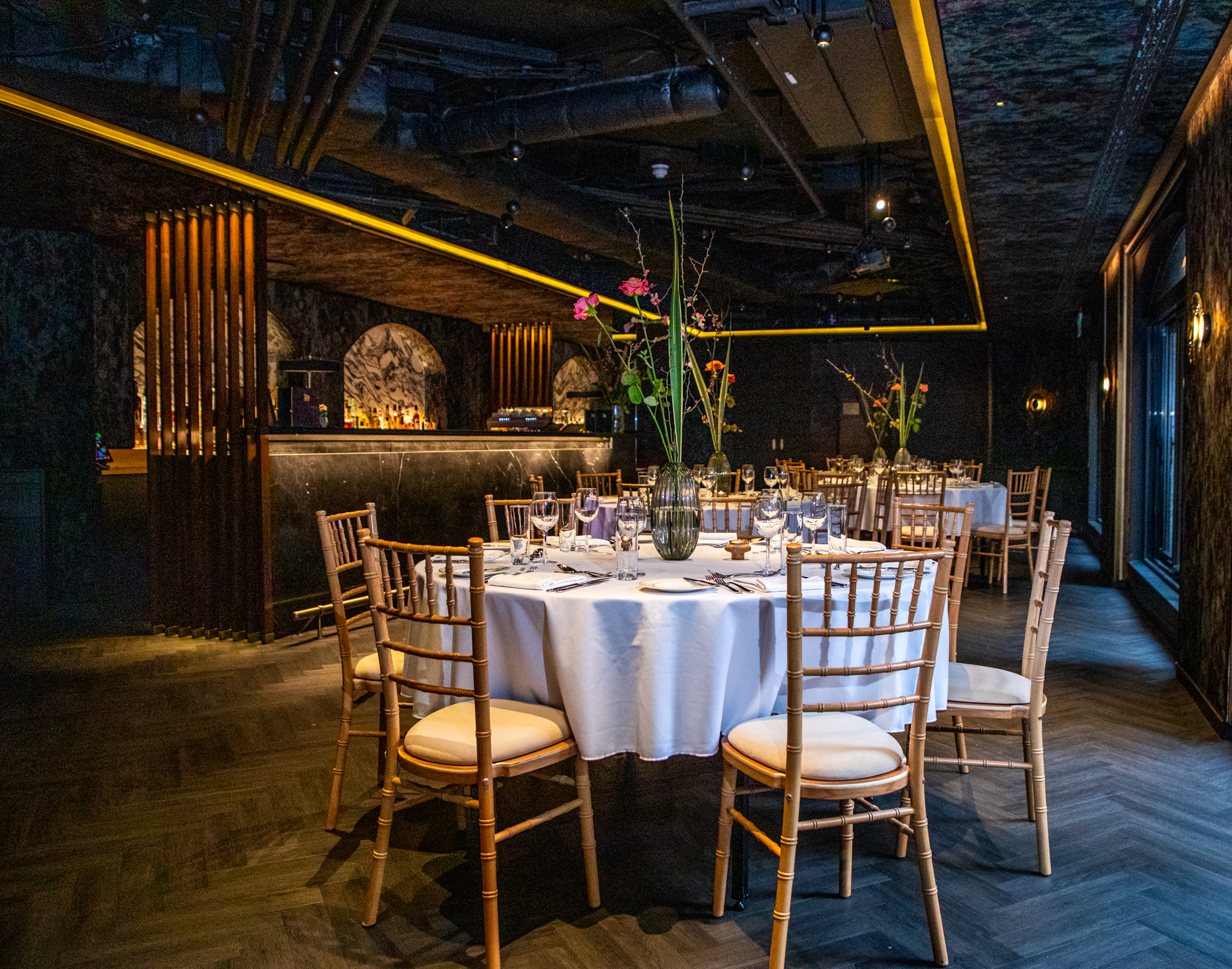 Elegant dining setup at All Event Spaces, ideal for corporate gatherings and exclusive events. - Banner