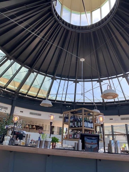 Stylish Mezzanine venue with glass dome ceiling for corporate events and social celebrations.