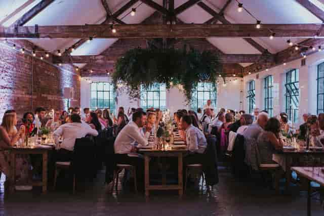 Event space in Loft Studios with rustic decor, ideal for dinner celebrations.
