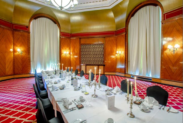 Elegant dining room in Empire Suite, The Adelphi Hotel, perfect for corporate events and celebrations.