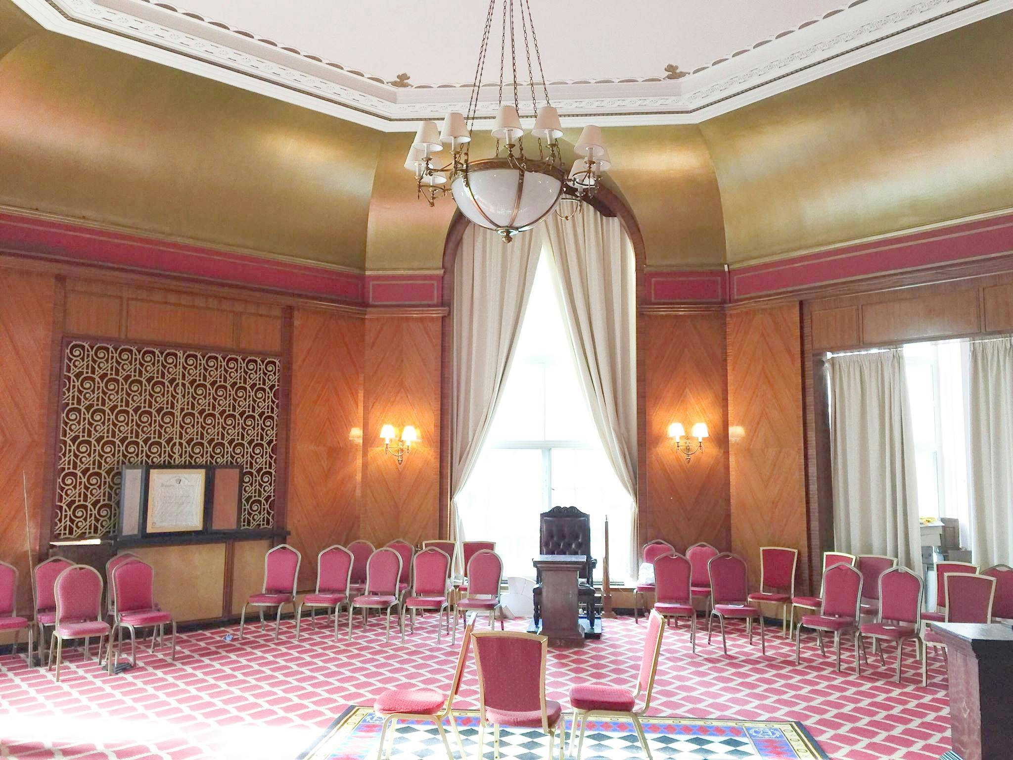 Empire Suite at The Adelphi Hotel, elegant meeting room with pink chairs for workshops.