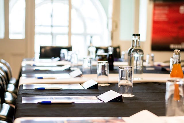 Executive Suite at The Adelphi Hotel with organized meeting setup for professional events.